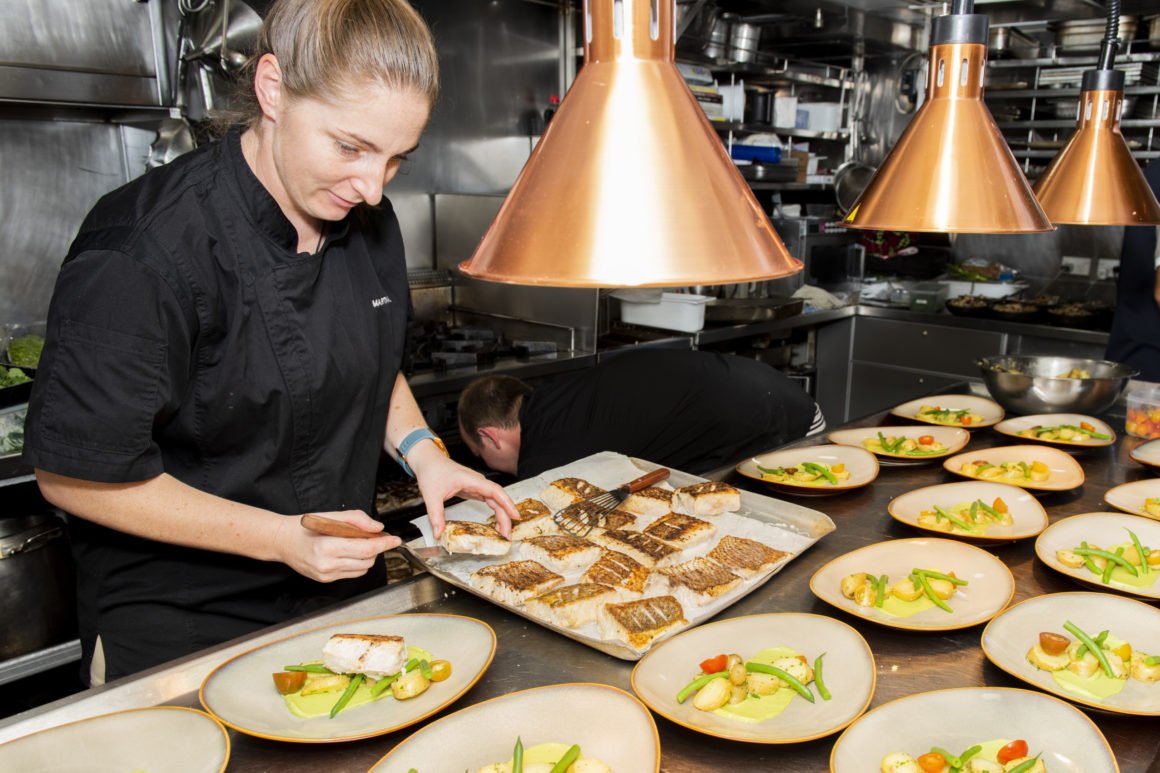 Chef arranging Food - True North Cruise