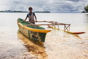Sepik River Boy with Canoe