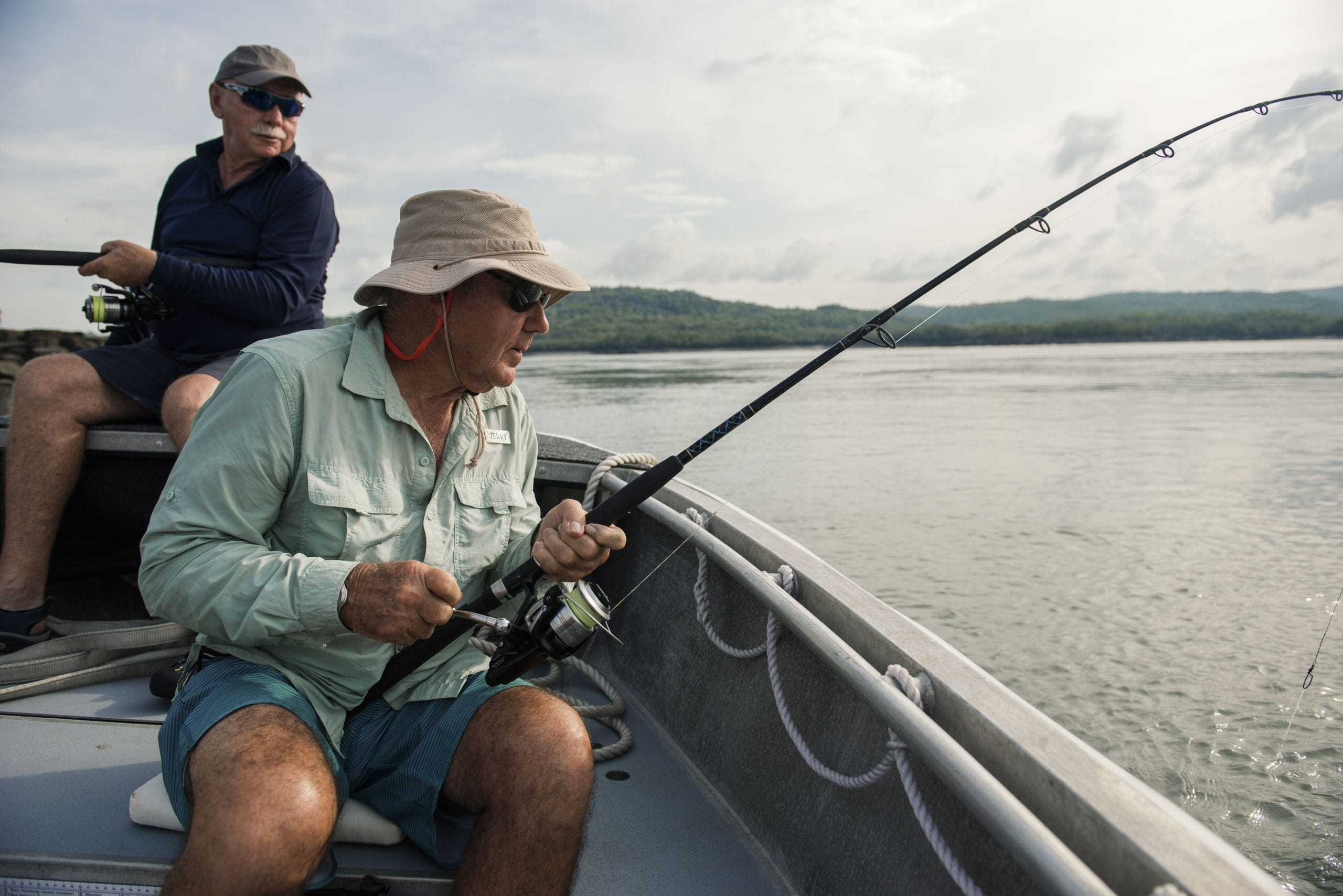 Fishing from tender boat showcasing Winyalkin Island highlights and aquatic adventures in remote waters