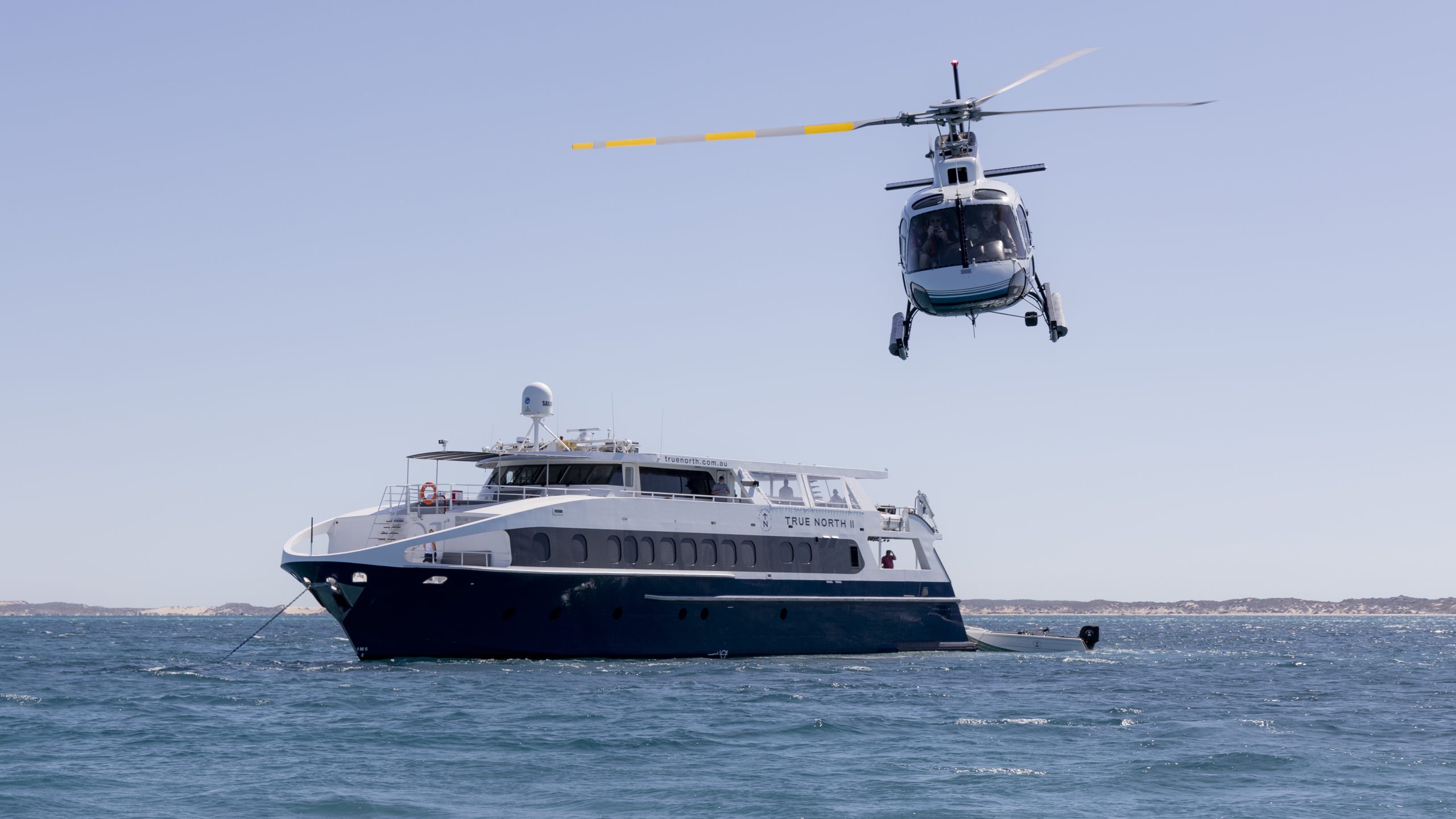 True North 10-cabin adventure yacht and helicopter