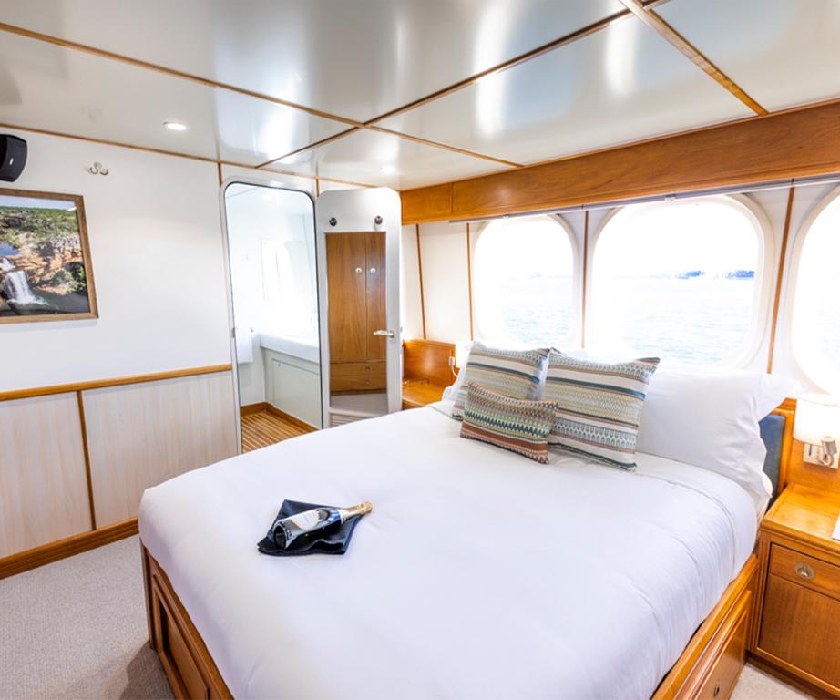 Refilling glasses tidying rooms - True North Adventure Cruises