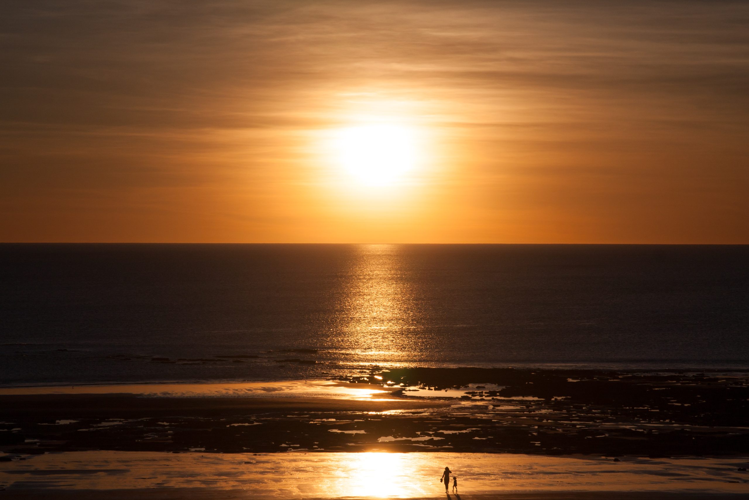 Red sun sets in cable beach